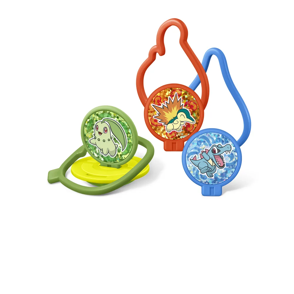 Wobbling Ring Toss toy with green and yellow base and holographic panels of Chikorita, Cyndaquil and Totodile