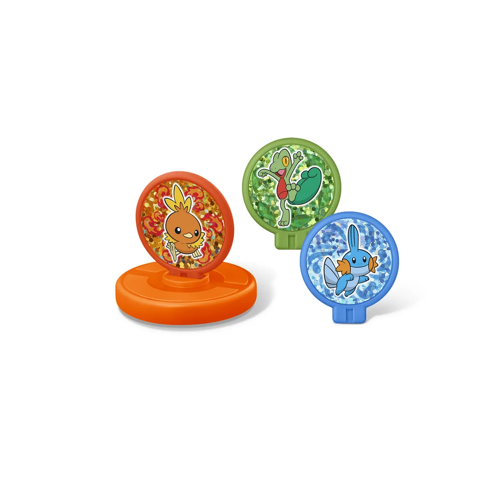 Spinning top toy with an orange base and holographic panels of Torchic, Treecko and Mudkip