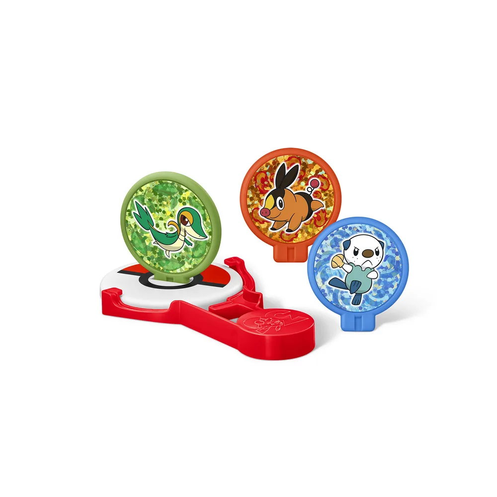 Squeeze Shooting toy with a red launching arm and holographic panels of Snivy, Tepig and Oshawott